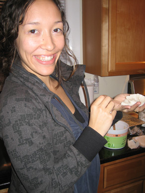 Katrina wraps up a soup dumpling
